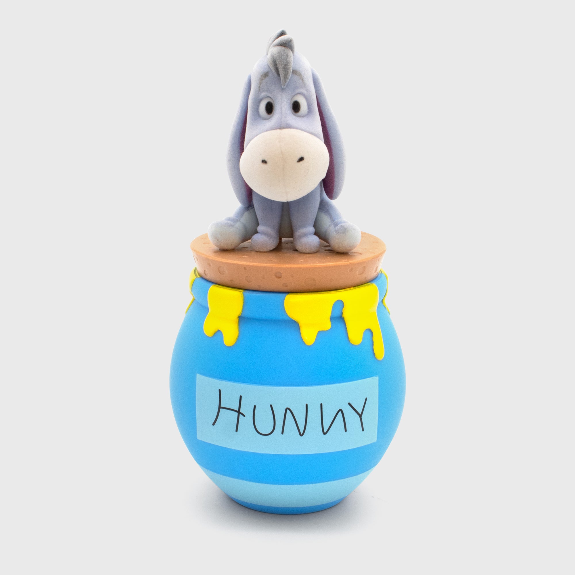 flock eeyore on top of hunny pot