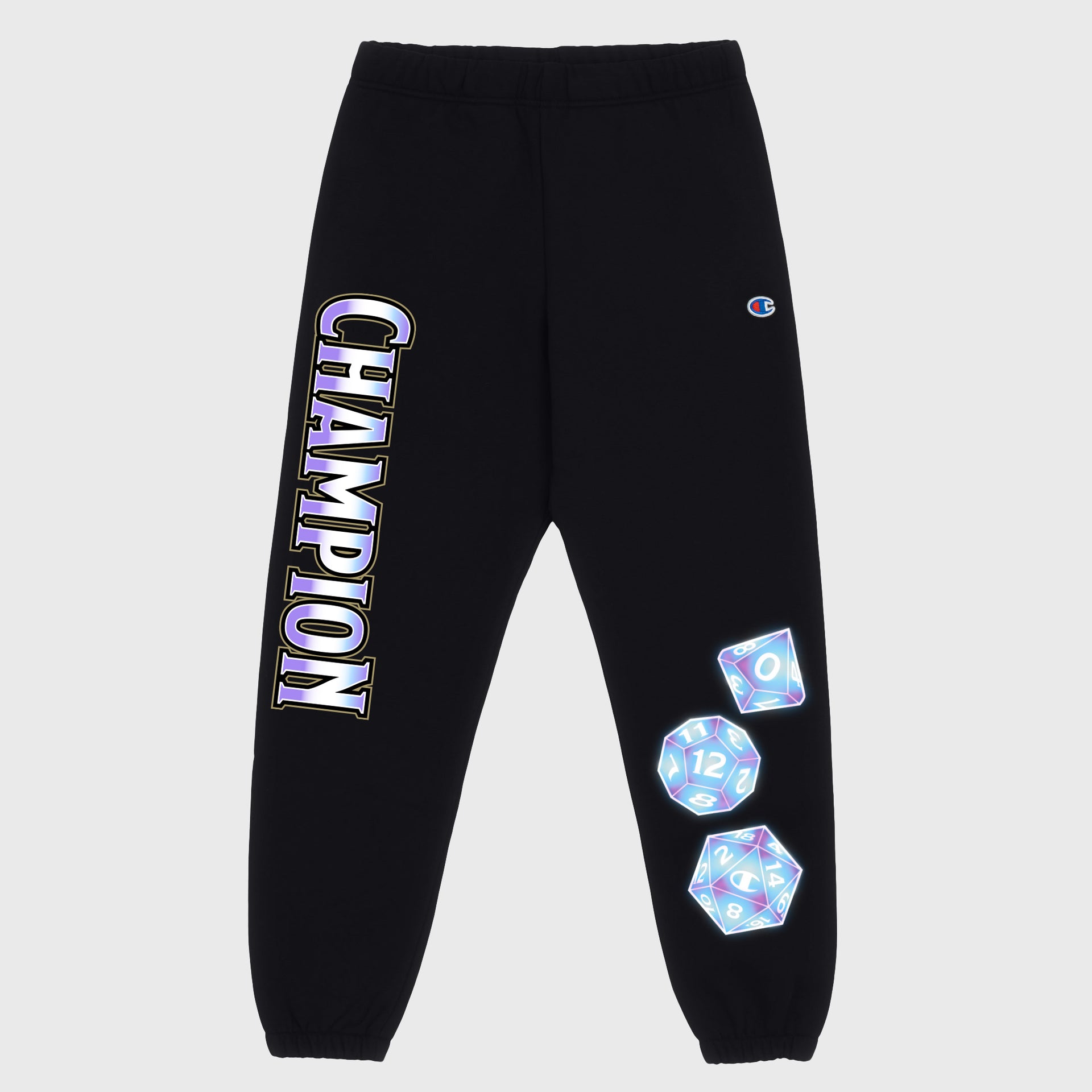 dungeons and dragons sweatpants front. champion written on right leg. d10, d12, and d20 die on left leg.