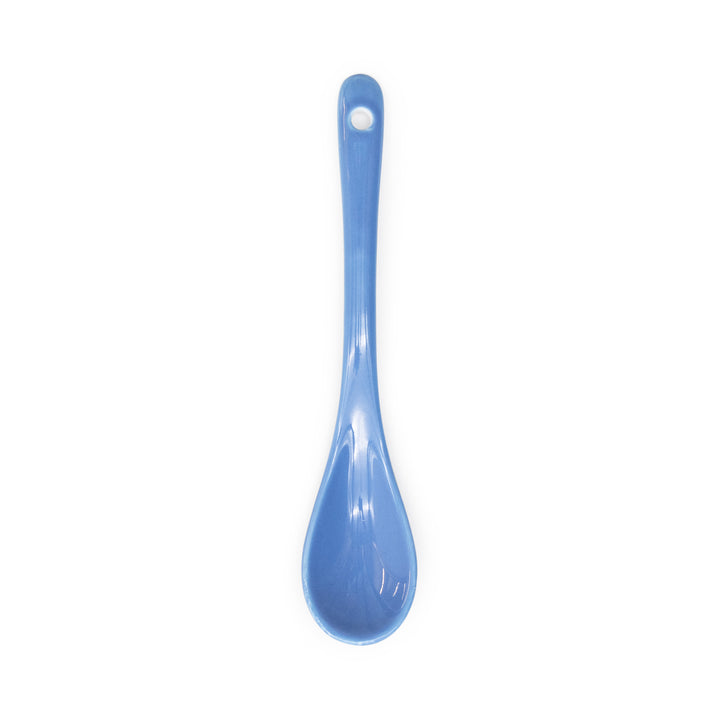 Blue spoon on a white background