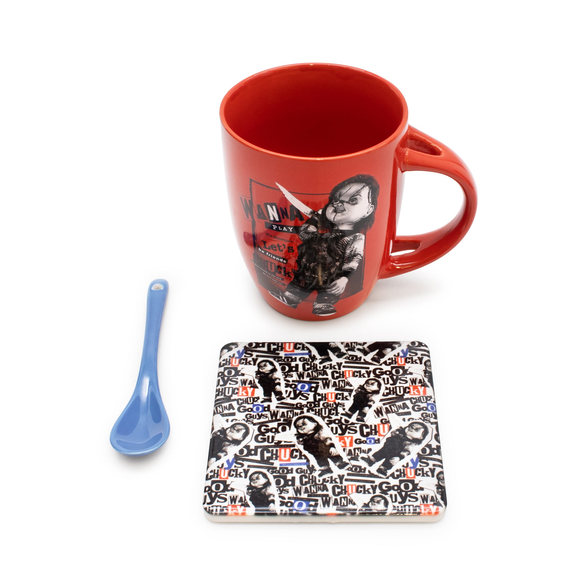 Red mug with graphic design, black and white coaster, and blue spoon on a white background