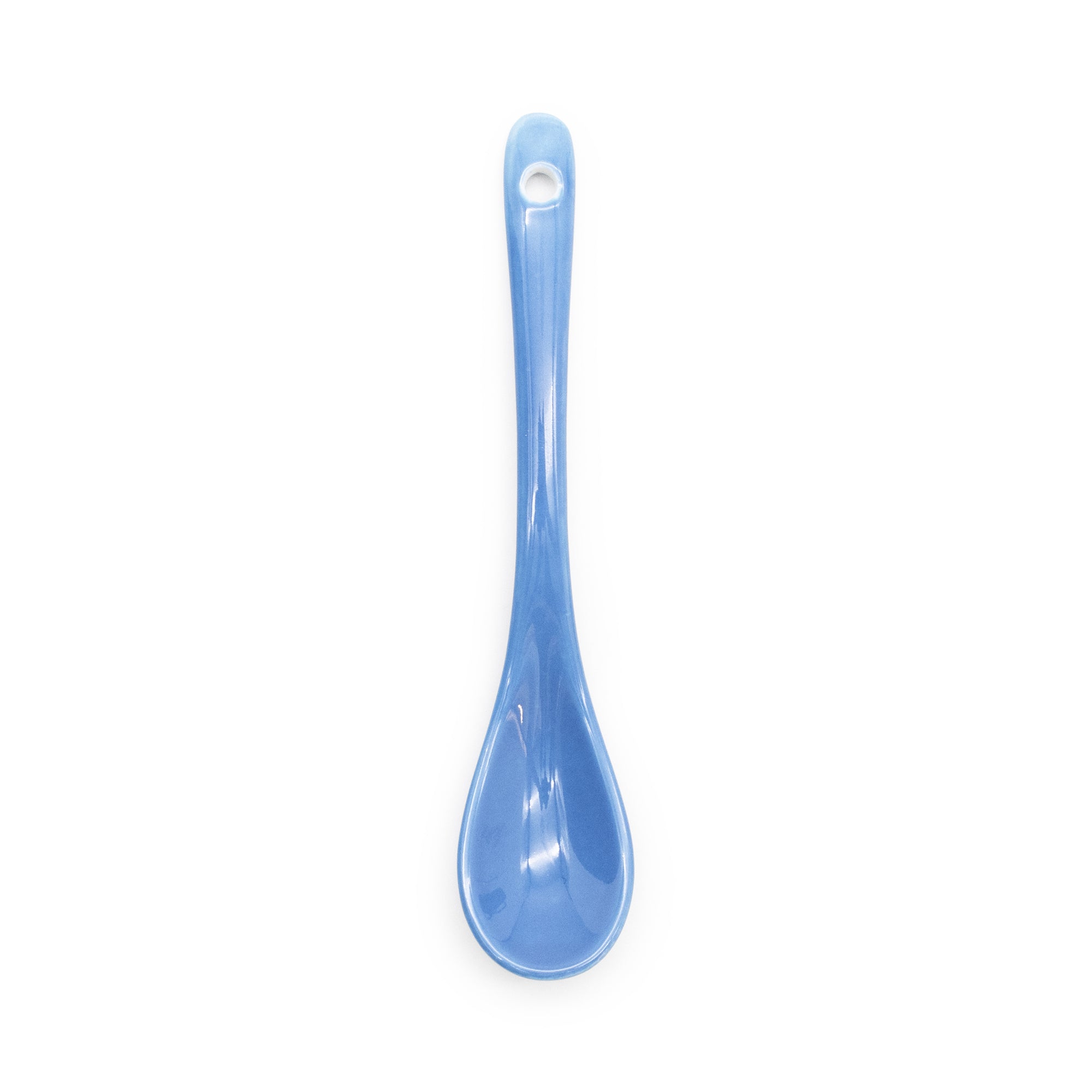 Blue spoon on a white background