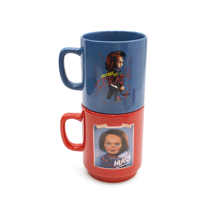 Two mugs stacked on top of each other with character designs and text.