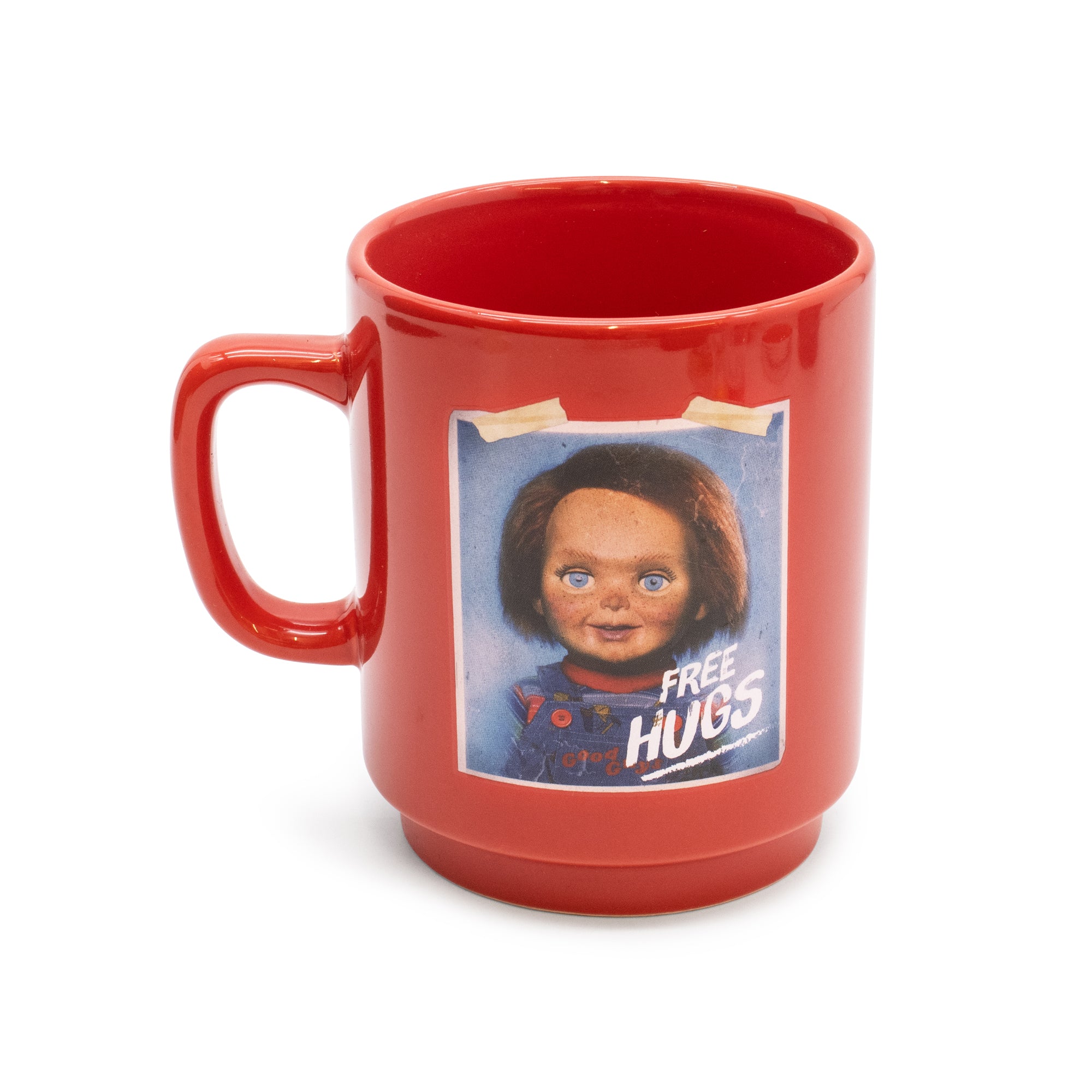 Red mug with a graphic of a doll and 'Free Hugs' text on a white background