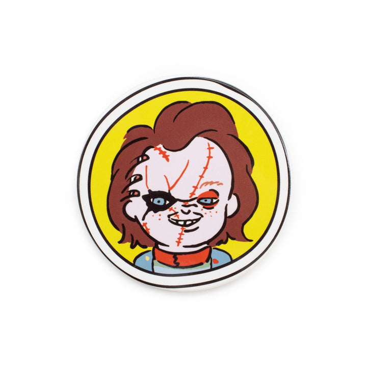 Circular coaster with a character design on a yellow background