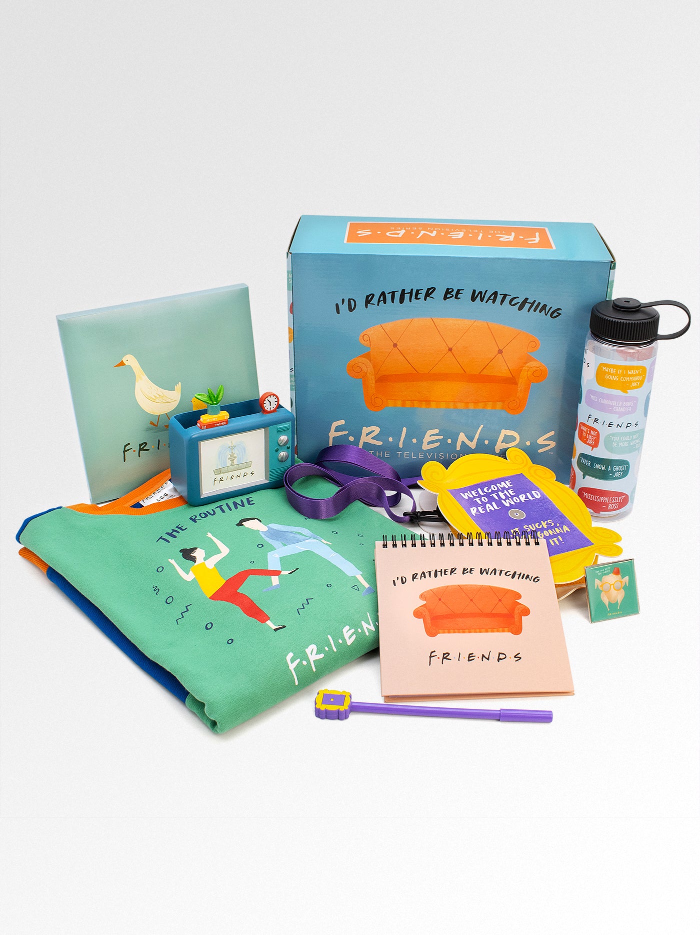 Collection of 'Friends' themed stationery items including notebooks, a water bottle, and pouches on a white background.