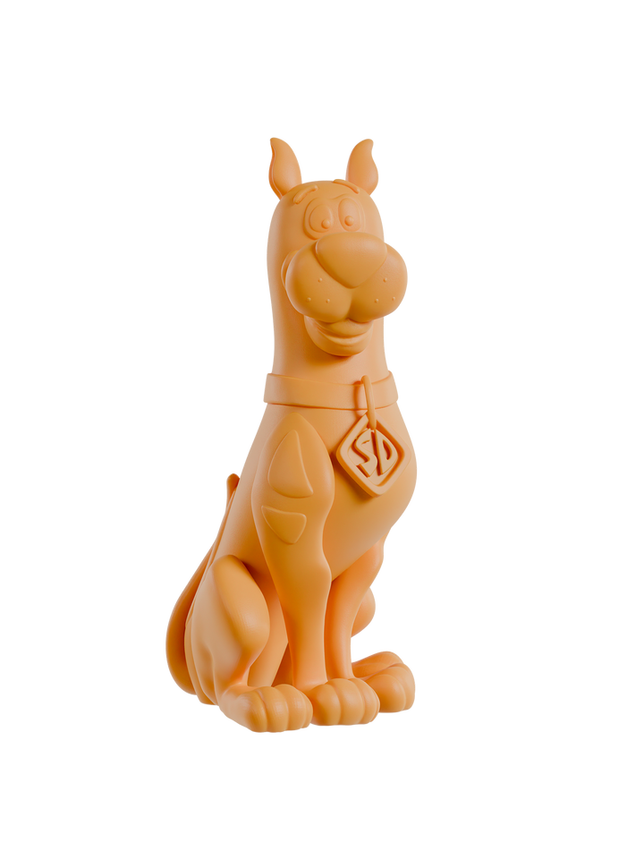 Orange dog-shaped figurine on a white background