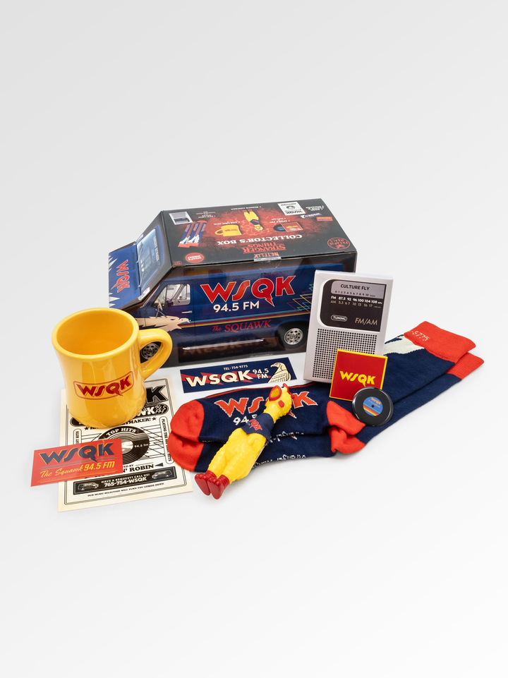 Collection of WSQK branded items including a mug, socks, and radio on a white background