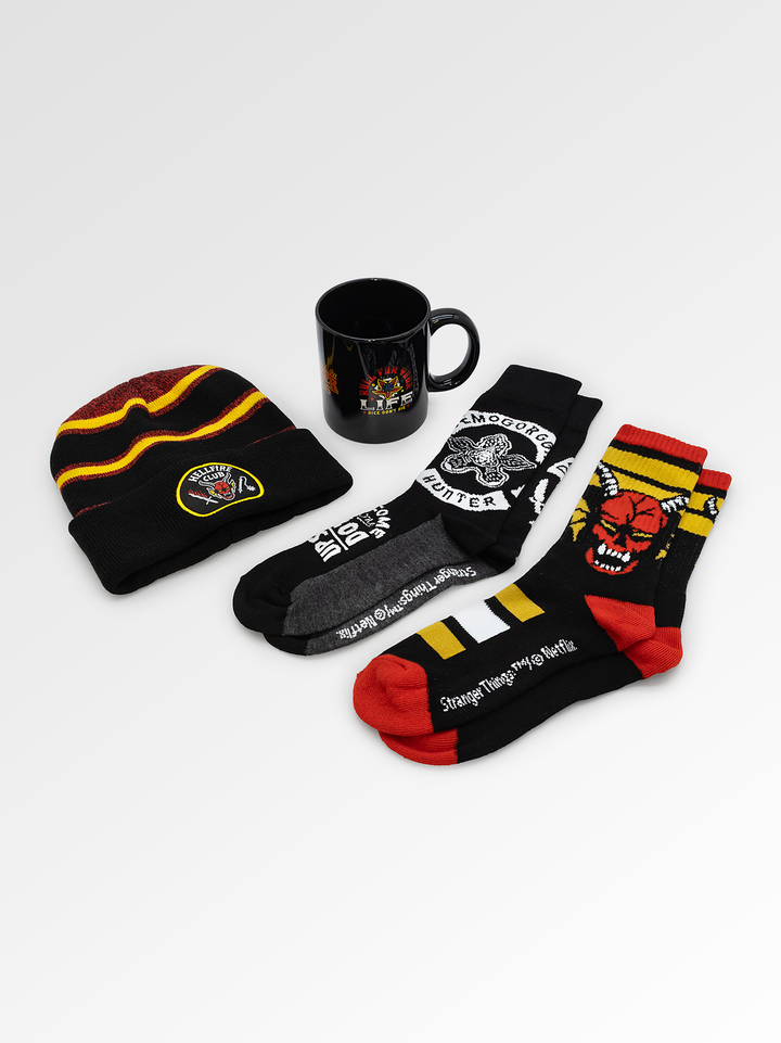 stranger things bundle. beanie with hellfire club on it. mug. 2 pairs of crew socks. one with hellfire club, other with demogorgon hunter
