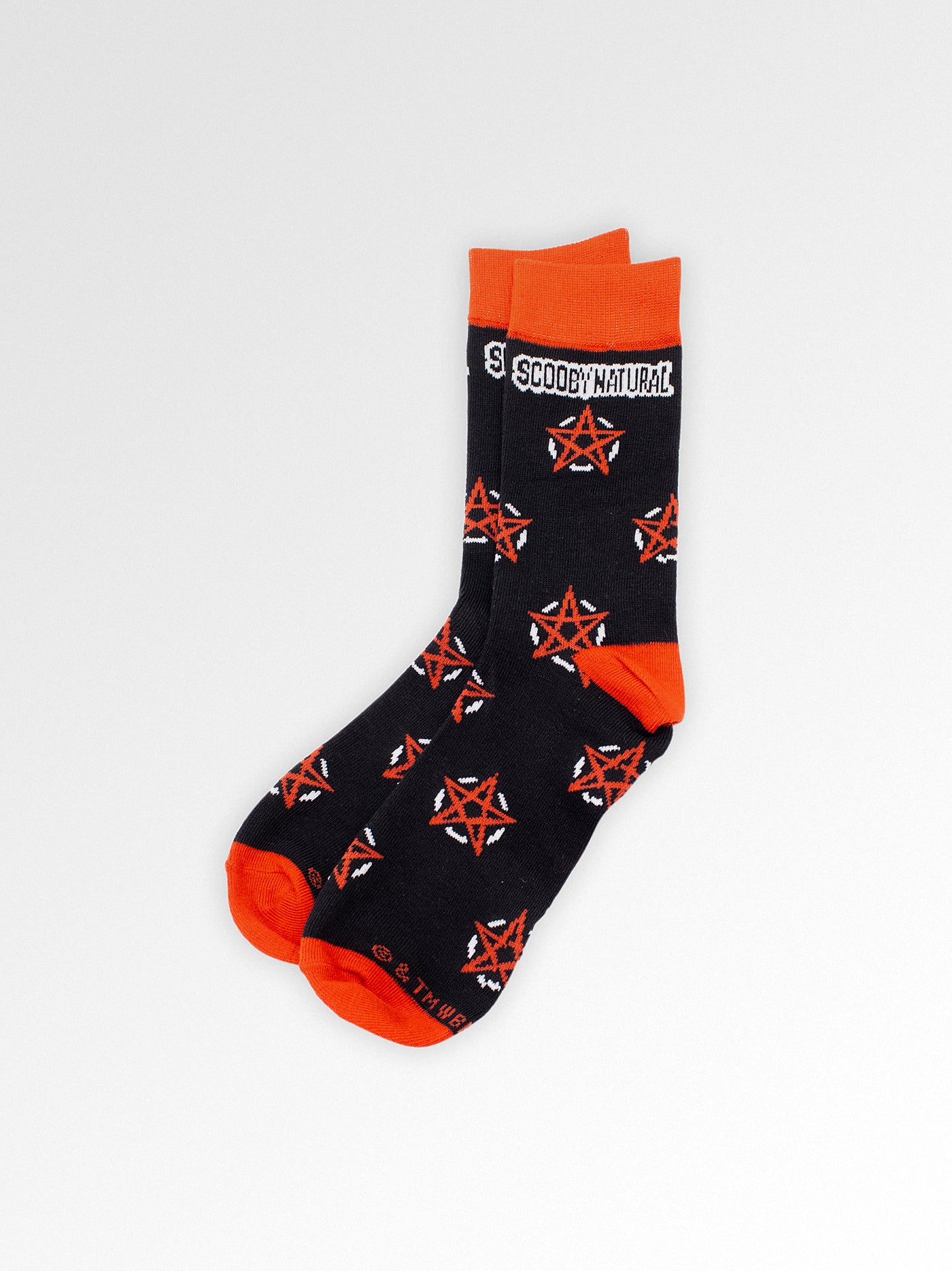crew socks. star pentagram pattern. text on top: scoobynatural