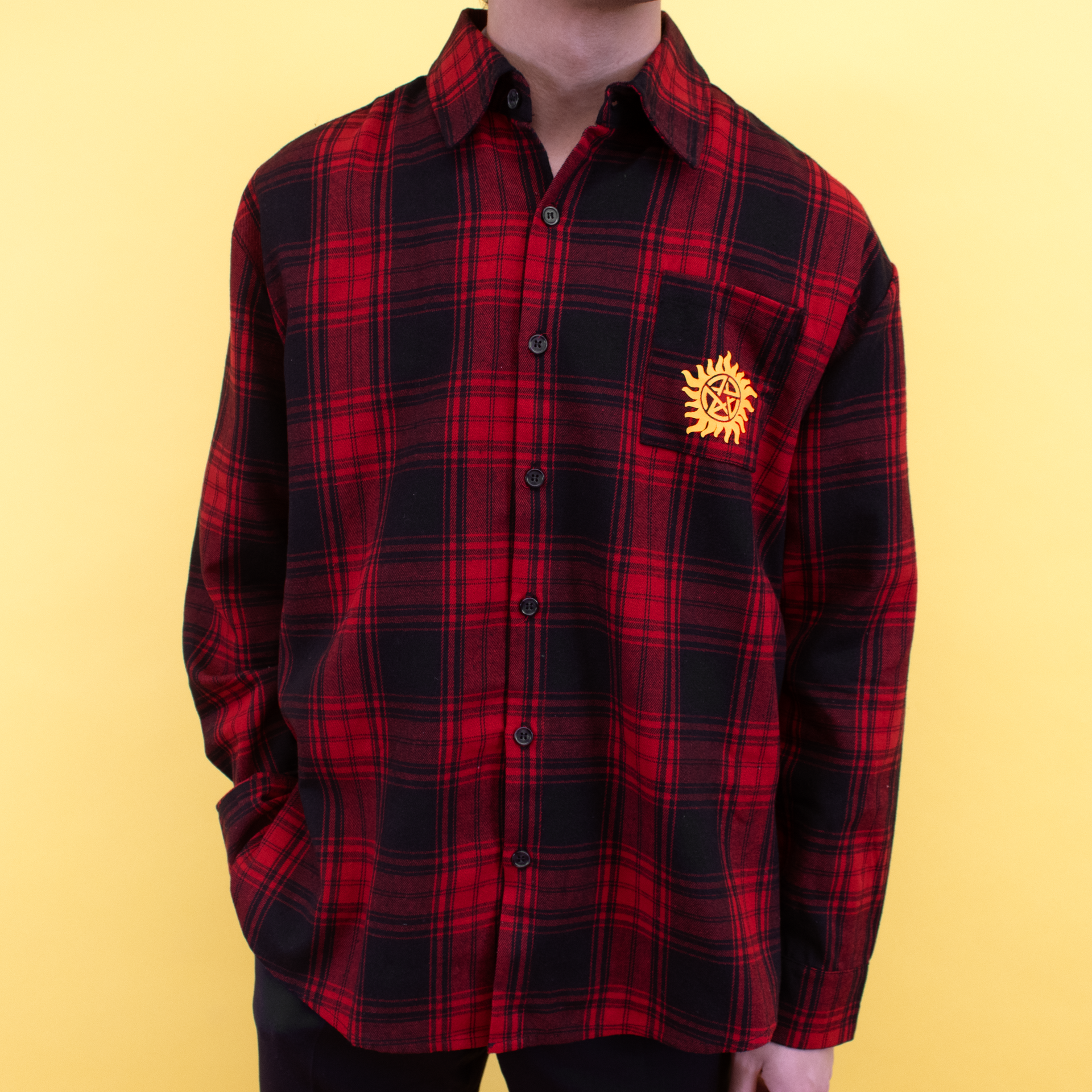 supernatural spookynatural plaid button down shirt. left pocket has winchesters supernatural symbol