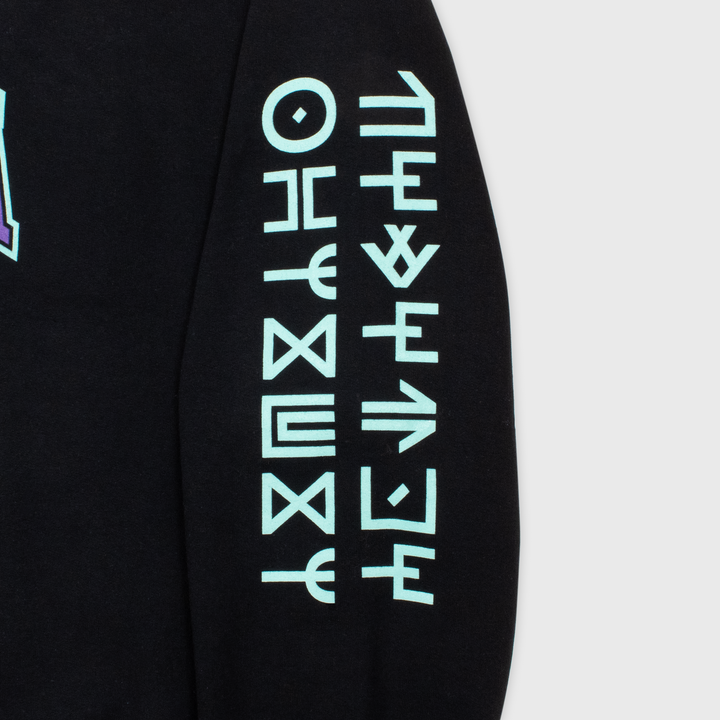 close up of left sweatshirt sleeve. image: wakanda lanuage written light blue white font