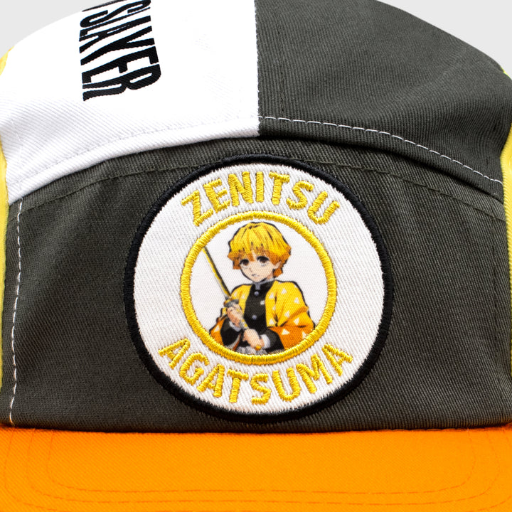 Close up of patch on front of hat. Image: Boy with blonde hair. Text on patch: Zenitsu Agatsuma