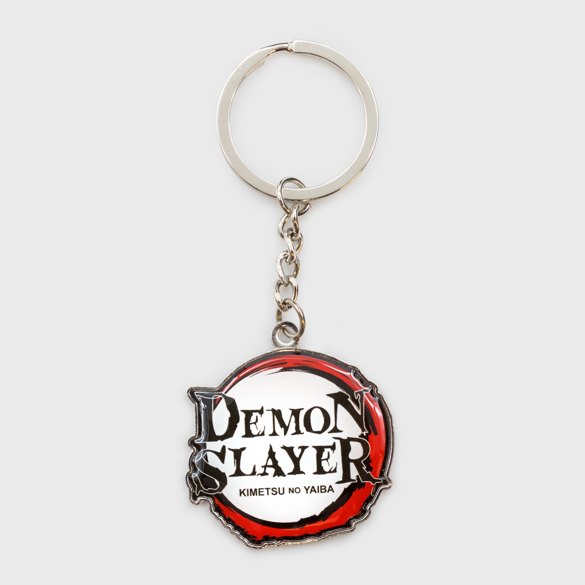 keychain with demon slayer logo.