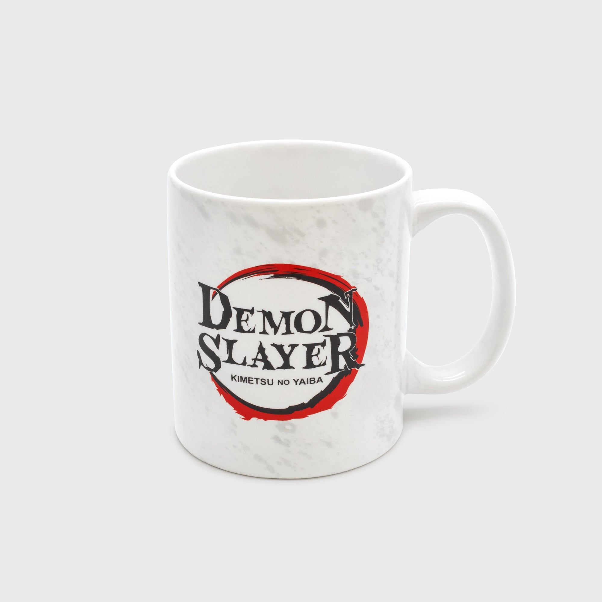 ceramic mug. other side shows demon slayer logo. logo says: demon slayer kimetsu no yaiba.