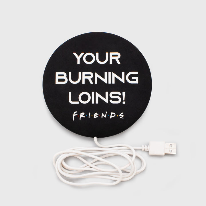mug warmer. usb cord. text says: your burning lions! friends
