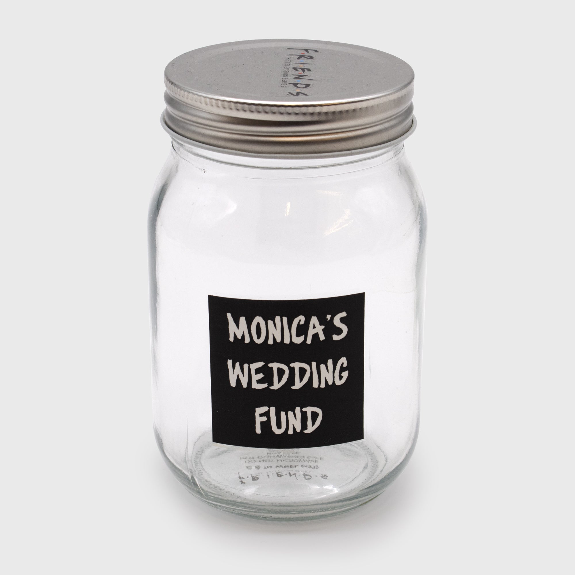 clear mason jar. sticker says: monica's wedding fund.