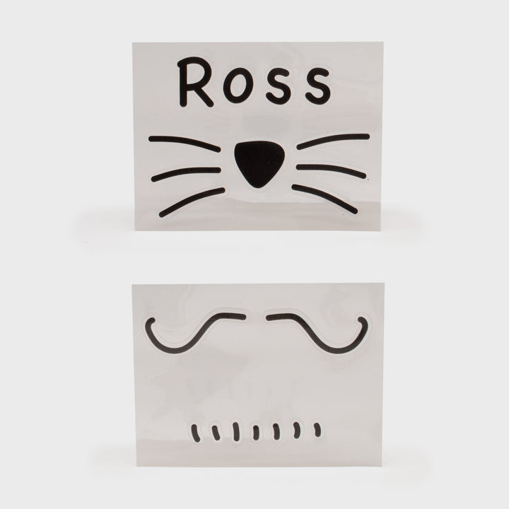 friends face stickers. set of 2. one: ross with cat whiskers and nose. other: mustache with lines for beard.