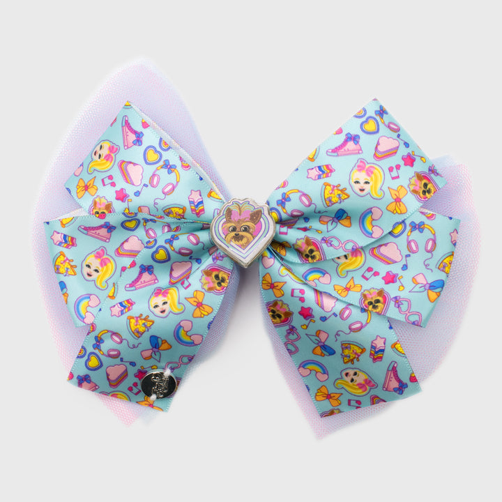 jojo siwa bow. pattern om bow: jojo, bowbow, pizza, music notes, high top shoes, stars, headphones, rainbows, clouds, hearts. charm in middle: bowbow in a heart.