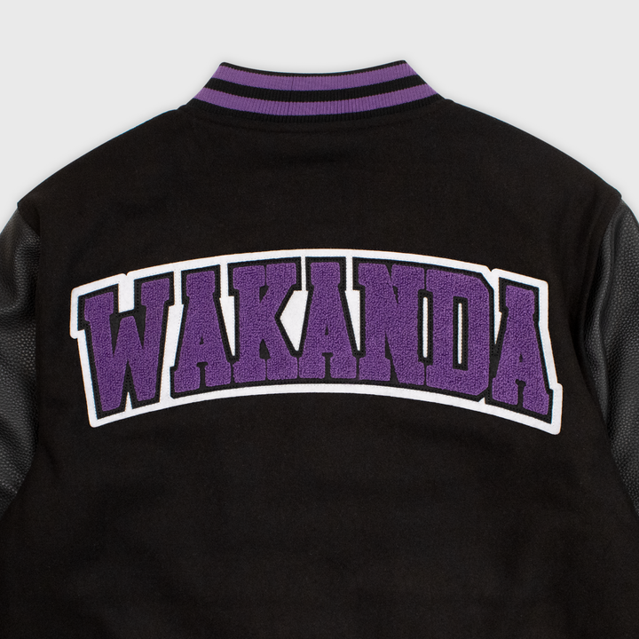 close up of back of jacket. patch says WAKANA in purple letters.