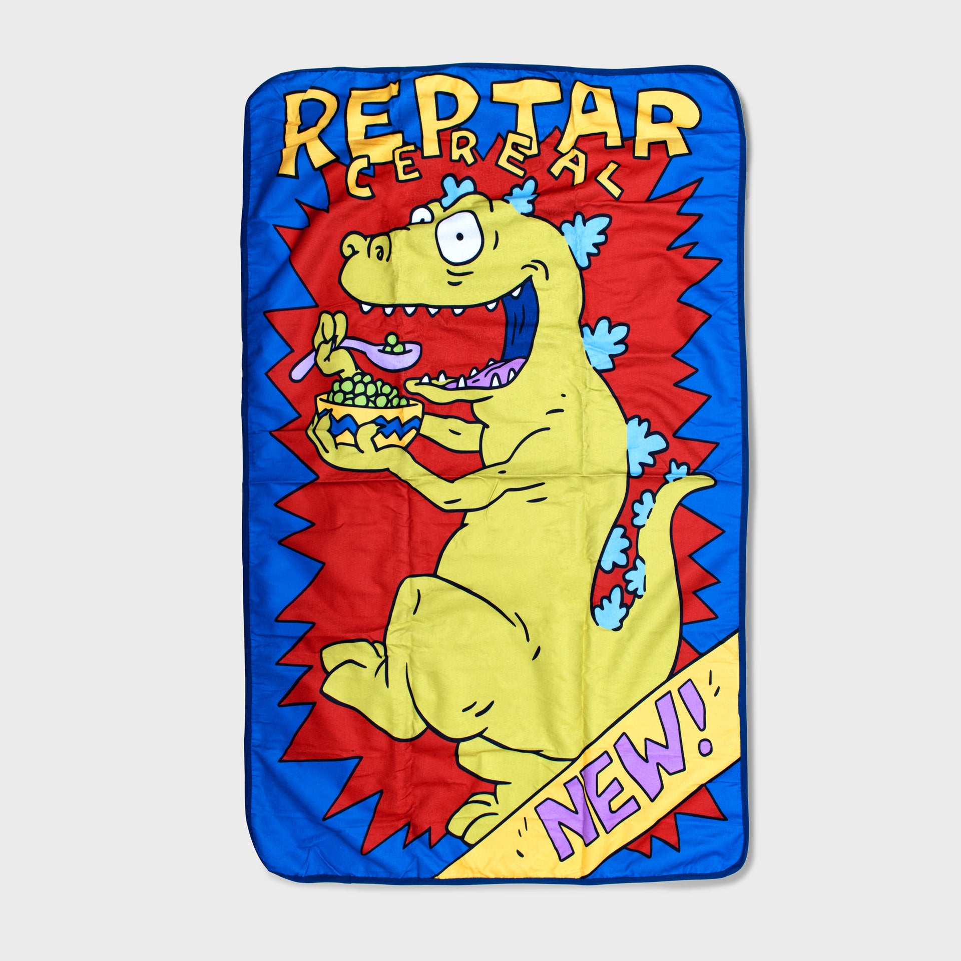 reptar cereal picnic blanket. image: reptar eating cereal. text: reptar cereal new!