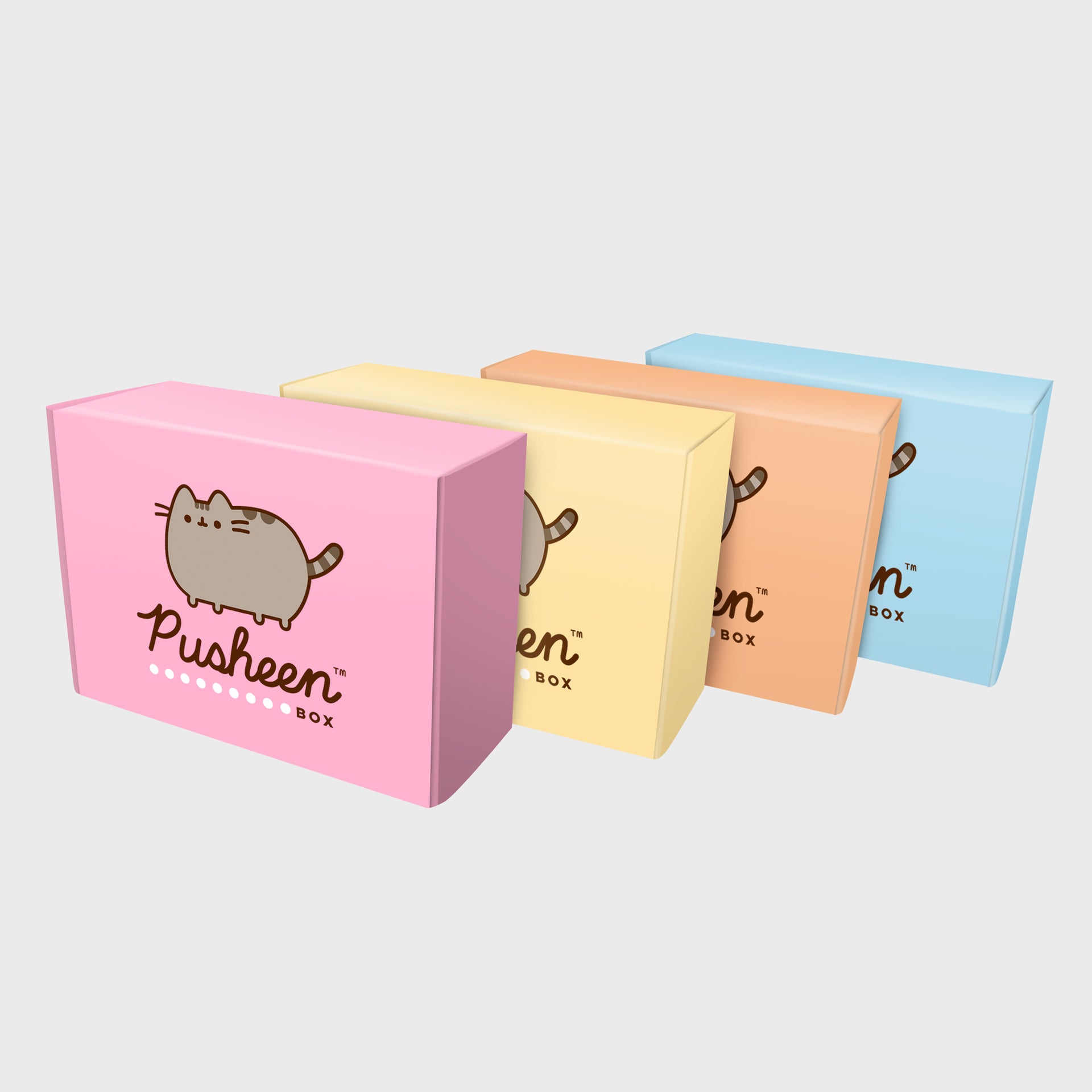 four pusheen boxes stacked next to each other