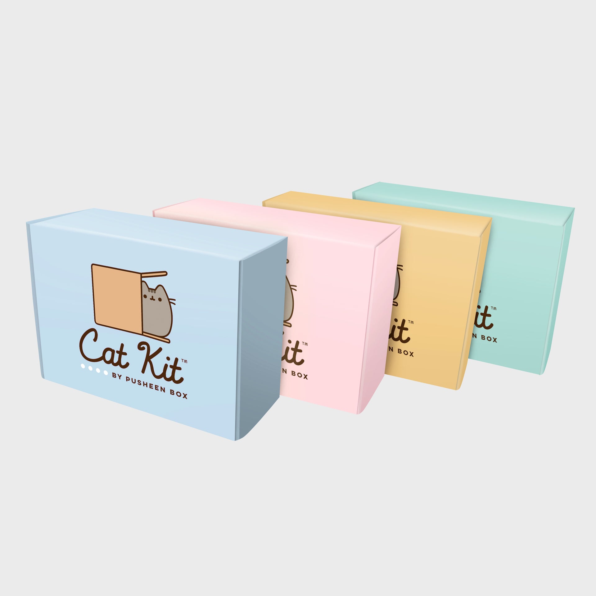 four cat kit boxes stacked next to each other